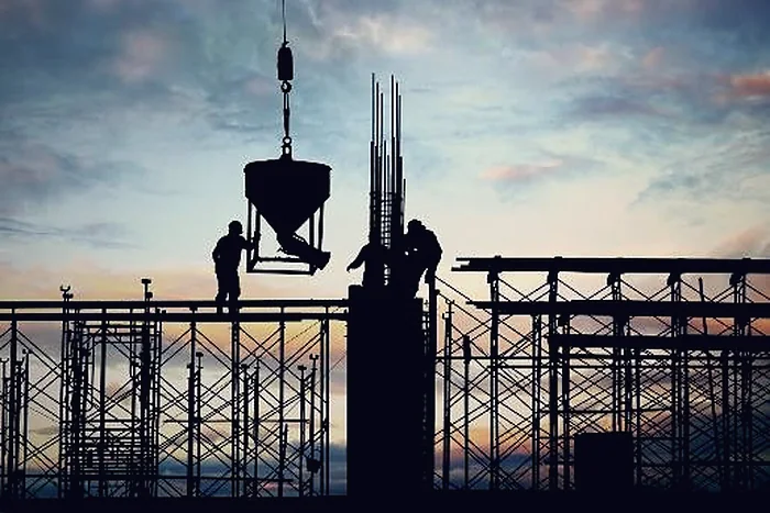 Site construction work at dusk