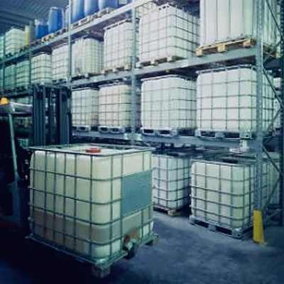 Intermediate bulk containers racked in a chemical store